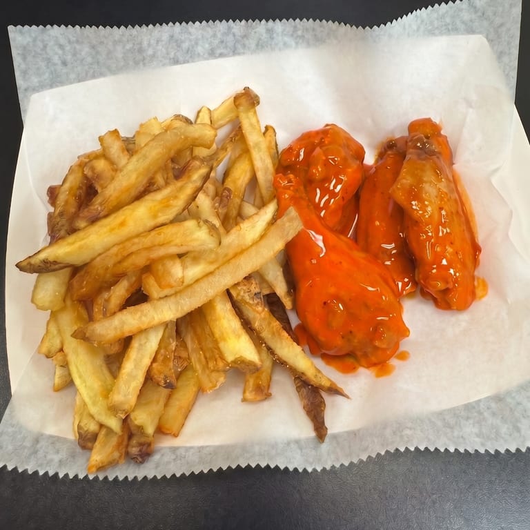 Enjoy our shrimp, chicken wings, nuggets & fries